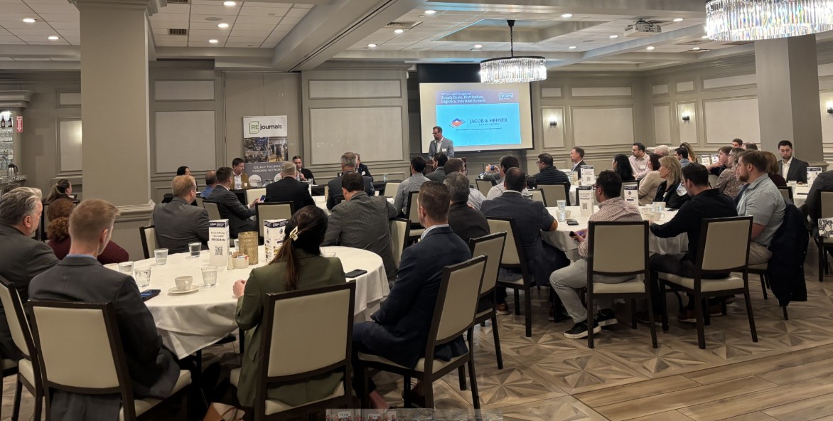 Noel Liston discussing Market Trends at recent Industrial Summit Image